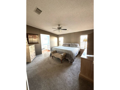 Welcome to this beautiful, spacious 3-bedroom split plan home on Schalamar Creek Golf and Country Club in Florida - for sale on GolfHomes.com, golf home, golf lot