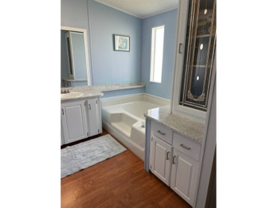 Welcome to this beautiful, spacious 3-bedroom split plan home on Schalamar Creek Golf and Country Club in Florida - for sale on GolfHomes.com, golf home, golf lot
