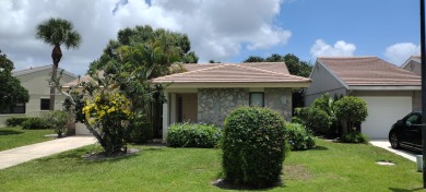 Beautiful move in ready 2/2/1 home located in Martin Downs. Open on Martin Downs Country Club in Florida - for sale on GolfHomes.com, golf home, golf lot