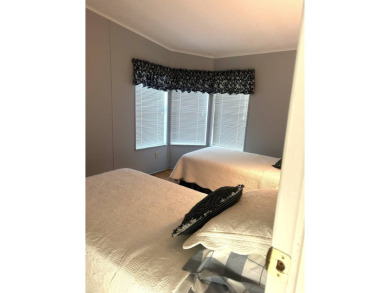 Welcome to this beautiful, spacious 3-bedroom split plan home on Schalamar Creek Golf and Country Club in Florida - for sale on GolfHomes.com, golf home, golf lot