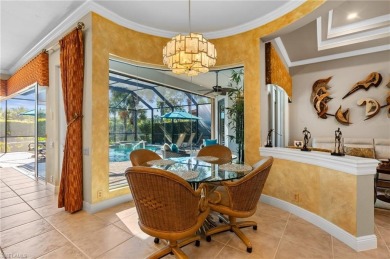 Nestled along the water, this breathtaking estate home on Miromar Lakes Golf Club in Florida - for sale on GolfHomes.com, golf home, golf lot