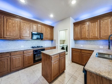 Welcome to this beautifully designed 3-bedroom, 2.5-bath home on WaterChase Golf Club in Texas - for sale on GolfHomes.com, golf home, golf lot