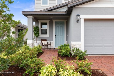 Welcome to 118 Pitching Wedge Drive, a stunning 2023-built home on LPGA International Golf Course in Florida - for sale on GolfHomes.com, golf home, golf lot
