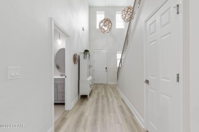 Welcome to 118 Pitching Wedge Drive, a stunning 2023-built home on LPGA International Golf Course in Florida - for sale on GolfHomes.com, golf home, golf lot