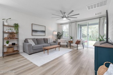 Welcome to 118 Pitching Wedge Drive, a stunning 2023-built home on LPGA International Golf Course in Florida - for sale on GolfHomes.com, golf home, golf lot