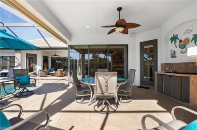 Nestled along the water, this breathtaking estate home on Miromar Lakes Golf Club in Florida - for sale on GolfHomes.com, golf home, golf lot