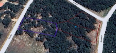 Beautiful corner lot build site with lake views and mature oak on Nocona Hills Golf Course in Texas - for sale on GolfHomes.com, golf home, golf lot