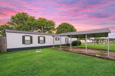 Welcome to Holiday Villages of Fork, a gated lakefront community on Links At Lands End in Texas - for sale on GolfHomes.com, golf home, golf lot