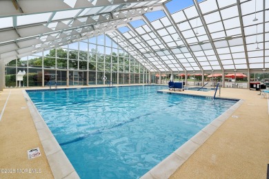 This extended Danbury model overlooks the 7th hole of the golf on Four Seasons Spa and Country Club in New Jersey - for sale on GolfHomes.com, golf home, golf lot