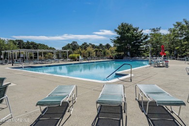 This extended Danbury model overlooks the 7th hole of the golf on Four Seasons Spa and Country Club in New Jersey - for sale on GolfHomes.com, golf home, golf lot