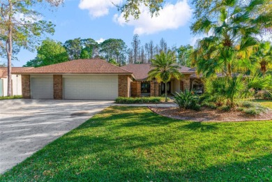 Discover elegance and comfort in this stunning 4-bedroom on Tampa Palms Golf and Country Club in Florida - for sale on GolfHomes.com, golf home, golf lot