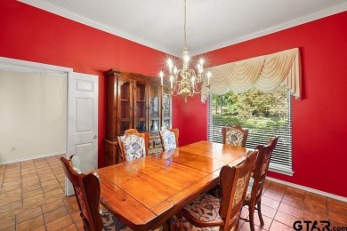 Nestled among mature trees, this charming 3-bedroom, 2-bath home on Hide-A-Way Lake Golf Course in Texas - for sale on GolfHomes.com, golf home, golf lot