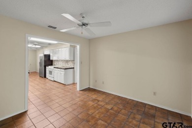 Nestled among mature trees, this charming 3-bedroom, 2-bath home on Hide-A-Way Lake Golf Course in Texas - for sale on GolfHomes.com, golf home, golf lot