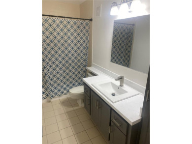 A must see recently renovated corner unit townhouse at Stamford on Bear Lakes Country Club in Florida - for sale on GolfHomes.com, golf home, golf lot