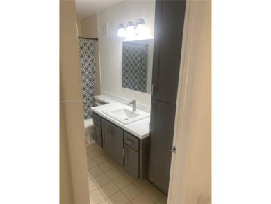 A must see recently renovated corner unit townhouse at Stamford on Bear Lakes Country Club in Florida - for sale on GolfHomes.com, golf home, golf lot