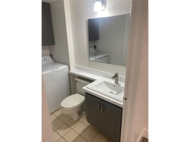 A must see recently renovated corner unit townhouse at Stamford on Bear Lakes Country Club in Florida - for sale on GolfHomes.com, golf home, golf lot