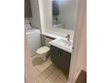 A must see recently renovated corner unit townhouse at Stamford on Bear Lakes Country Club in Florida - for sale on GolfHomes.com, golf home, golf lot