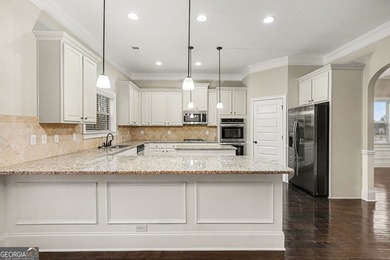 This 4-bedroom, 2.5-bath home located on a cul-de-sac street in on Crystal Lake Golf and Country Club in Georgia - for sale on GolfHomes.com, golf home, golf lot