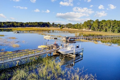 Beautiful brick custom home with FIRST FLOOR PRIMARY SUITE on Dunes West Golf Club in South Carolina - for sale on GolfHomes.com, golf home, golf lot