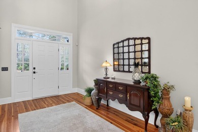 Beautiful brick custom home with FIRST FLOOR PRIMARY SUITE on Dunes West Golf Club in South Carolina - for sale on GolfHomes.com, golf home, golf lot