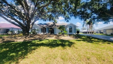 This charming home at 321 Duane Palmer Blvd in Sebring, FL has a on Spring Lake Golf Resort in Florida - for sale on GolfHomes.com, golf home, golf lot