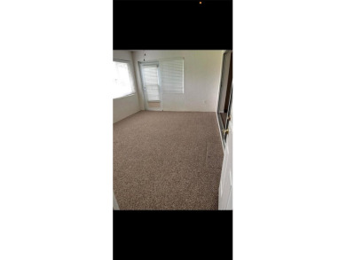 This charming home at 321 Duane Palmer Blvd in Sebring, FL has a on Spring Lake Golf Resort in Florida - for sale on GolfHomes.com, golf home, golf lot