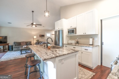 This beautifully remodeled 4 bed, 2 bath home in the Turtle Cove on Turtle Cove Golf Course in Georgia - for sale on GolfHomes.com, golf home, golf lot