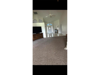 This charming home at 321 Duane Palmer Blvd in Sebring, FL has a on Spring Lake Golf Resort in Florida - for sale on GolfHomes.com, golf home, golf lot
