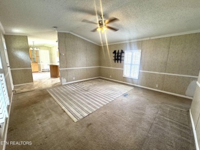 Welcome to your new home! This corner lot manufactured home in on Lake Tansi Village Country Club in Tennessee - for sale on GolfHomes.com, golf home, golf lot