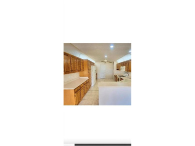 This charming home at 321 Duane Palmer Blvd in Sebring, FL has a on Spring Lake Golf Resort in Florida - for sale on GolfHomes.com, golf home, golf lot