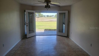 This charming home at 321 Duane Palmer Blvd in Sebring, FL has a on Spring Lake Golf Resort in Florida - for sale on GolfHomes.com, golf home, golf lot