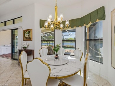 Discover refined WATERFRONT LIVING in the exclusive, gated on The Classics Country Club At Lely Resort in Florida - for sale on GolfHomes.com, golf home, golf lot