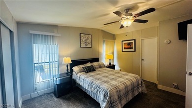 This impeccably maintained manufactured home features one of the on Riviera Golf Club in Florida - for sale on GolfHomes.com, golf home, golf lot