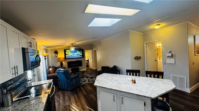 This impeccably maintained manufactured home features one of the on Riviera Golf Club in Florida - for sale on GolfHomes.com, golf home, golf lot