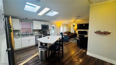 This impeccably maintained manufactured home features one of the on Riviera Golf Club in Florida - for sale on GolfHomes.com, golf home, golf lot