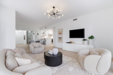 Discover a refined take on modern living in this fully renovated on Polo Club of Boca Raton in Florida - for sale on GolfHomes.com, golf home, golf lot