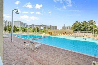 Ground-Floor Convenience Meets Resort-Style Living! This on Seascape Golf Course in Florida - for sale on GolfHomes.com, golf home, golf lot