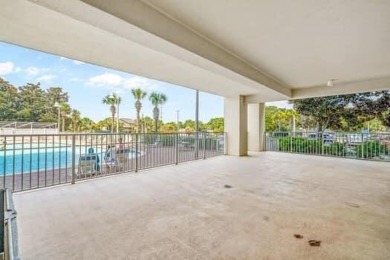 Ground-Floor Convenience Meets Resort-Style Living! This on Seascape Golf Course in Florida - for sale on GolfHomes.com, golf home, golf lot