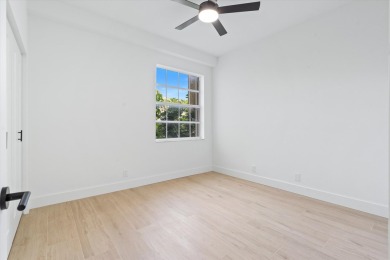 Discover a refined take on modern living in this fully renovated on Polo Club of Boca Raton in Florida - for sale on GolfHomes.com, golf home, golf lot