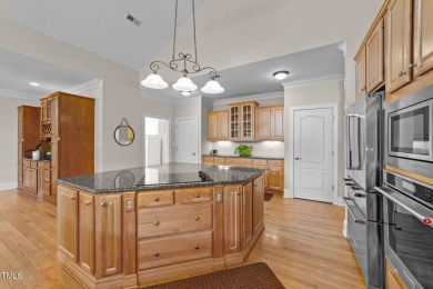 Discover exceptional Waterfront living in this stunning on River Golf and County Club at Lake Royale in North Carolina - for sale on GolfHomes.com, golf home, golf lot
