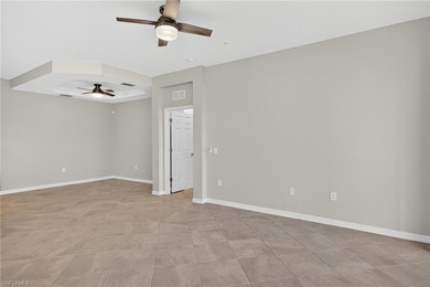 Experience serene resort-style living in this beautifully on Gateway Golf and Country Club in Florida - for sale on GolfHomes.com, golf home, golf lot