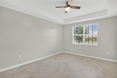 Experience serene resort-style living in this beautifully on Gateway Golf and Country Club in Florida - for sale on GolfHomes.com, golf home, golf lot