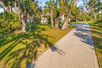 Most Picturesque Lot in Oak Ford! Nestled among live oaks and on Oak Ford Golf Club in Florida - for sale on GolfHomes.com, golf home, golf lot