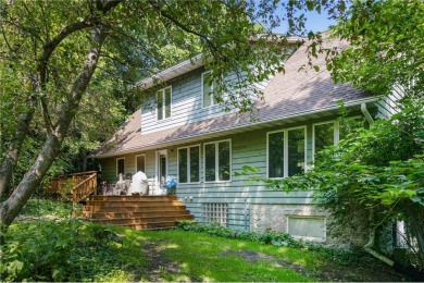 Nestled on 6 serene woodland acres, this house harmoniously on Faribault Golf and Country Club in Minnesota - for sale on GolfHomes.com, golf home, golf lot