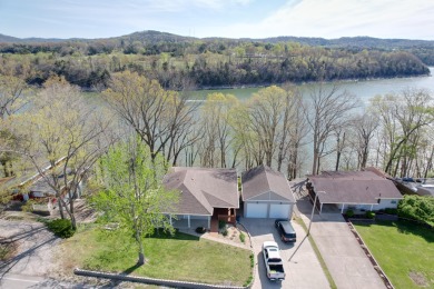 LAKEVIEW/PRIVATE DOCK This home offers a large wrap around deck on General Burnside Island Golf Course in Kentucky - for sale on GolfHomes.com, golf home, golf lot