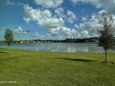 MOVE-IN READY WATERFRONT 4BR/3BA home in sought-after on LPGA International Golf Course in Florida - for sale on GolfHomes.com, golf home, golf lot