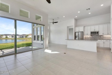 MOVE-IN READY WATERFRONT 4BR/3BA home in sought-after on LPGA International Golf Course in Florida - for sale on GolfHomes.com, golf home, golf lot