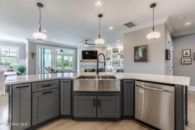 Wake up every day to serene, uninterrupted views of the pond and on Sea Trail Golf Resort in North Carolina - for sale on GolfHomes.com, golf home, golf lot
