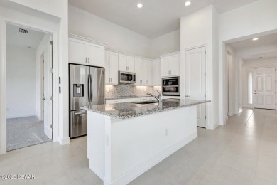 MOVE-IN READY WATERFRONT 4BR/3BA home in sought-after on LPGA International Golf Course in Florida - for sale on GolfHomes.com, golf home, golf lot
