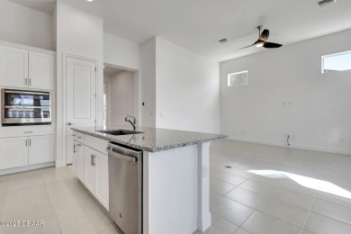 MOVE-IN READY WATERFRONT 4BR/3BA home in sought-after on LPGA International Golf Course in Florida - for sale on GolfHomes.com, golf home, golf lot